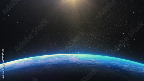 Earth from space. Stars twinkle. No sun in the frame. Flight over the Earth. 4K. Sunrise. The earth slowly rotates. Realistic atmosphere.