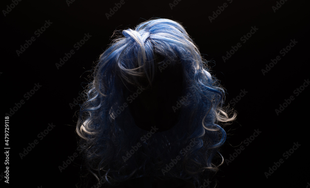 blue wig on black background