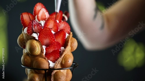 Hong Kong style egg waffle with strawberry photo