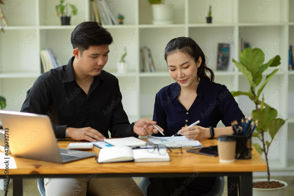 Male and female lawyer working and brainstorming in the office. Male and female lawyer working and brainstorming in the office.