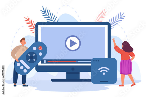 People watching video and digital television on monitor. Tiny man and woman holding remote control and wireless multimedia receiver box flat vector illustration. Entertainment, smart TV concept