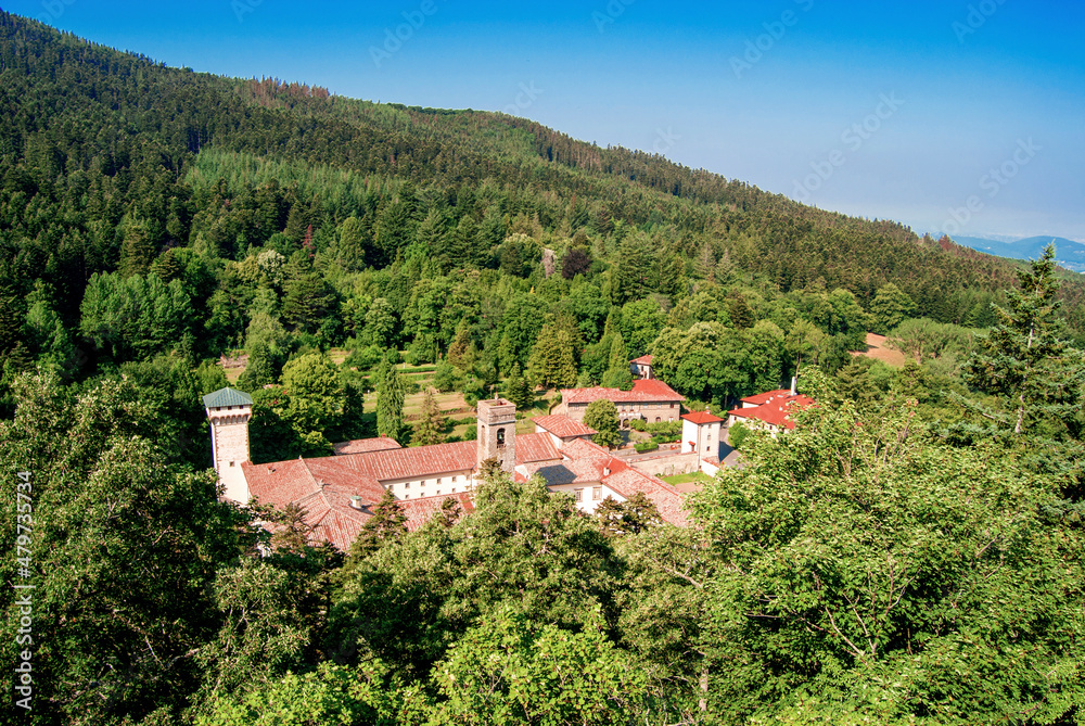 Aerial view of the Abbey of Vallombrosa, surrounded by forests of beech and founded in 11th century by Giovanni Gualberto, in the province of Florence, Italy. 