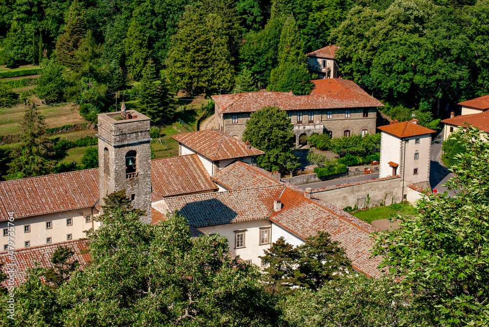 Aerial view of the Abbey of Vallombrosa, surrounded by forests of beech and founded in 11th century by Giovanni Gualberto, in the province of Florence, Italy. 