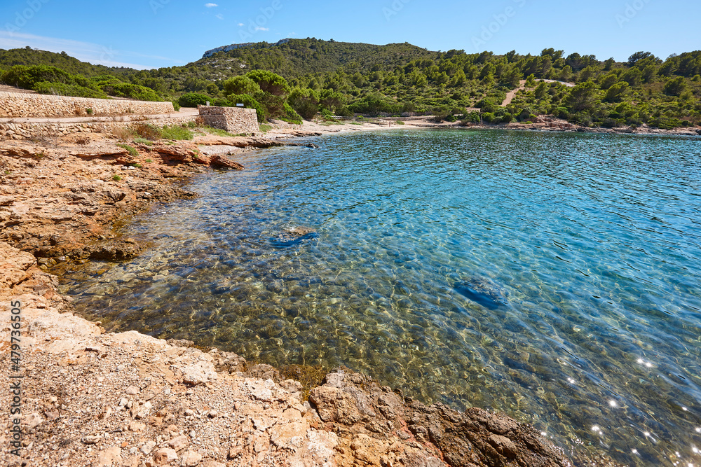 Turquoise waters in Cabrera island shoreline landscape. Balearic archipelago. Spain