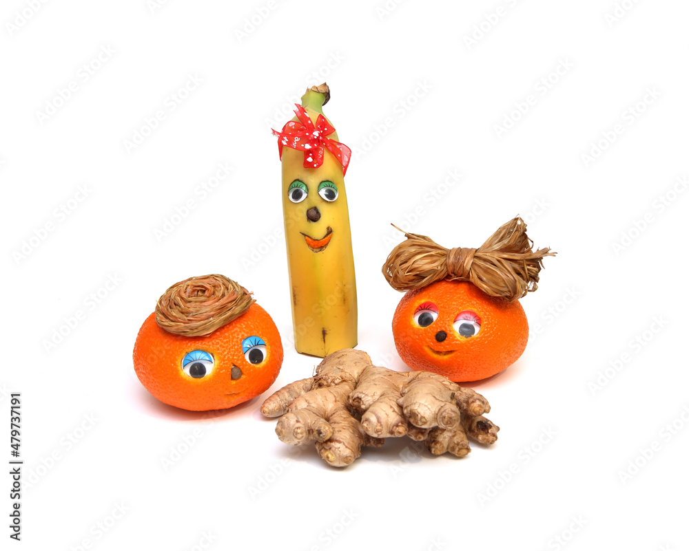 Orange. Banana. Ginger. cheerful round orange with eyes, nose and mouth, on an isolated white background. carving for oranges and fruits. space for text. Health care and alternative medicine.
