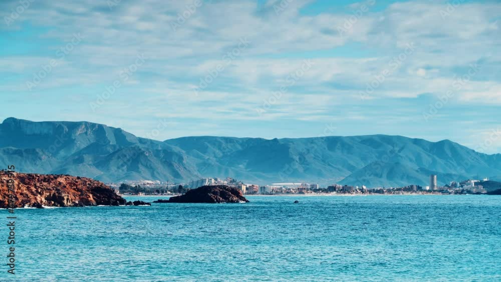 Seaside spanish landscape with Puerto de Mazarron in the distance. Mediterranean Sea, coastline in Murcia Spain. Seaside spanish landscape with Puerto de Mazarron in the distance. Mediterranean Sea, coastline in Murcia Spain.