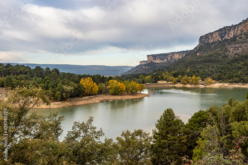 Rocky landscape with mountains lake La Toba reservoir. Serrania de Cuenca, Cuenca, Spain © rudiernst