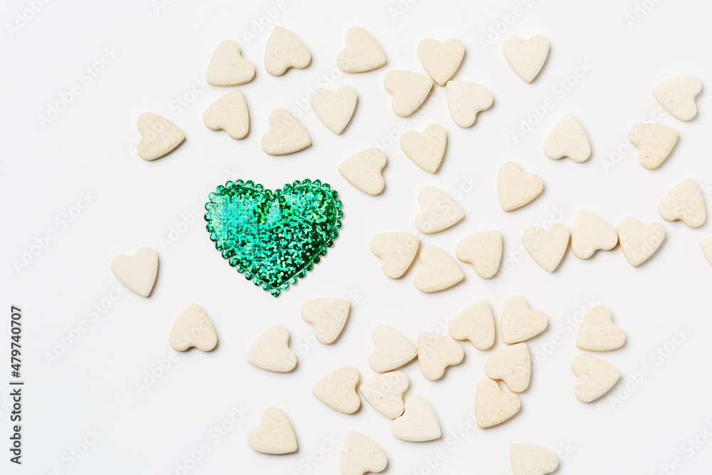 Heart-shaped little sweet cookies on white background Heart-shaped little sweet cookies on white background