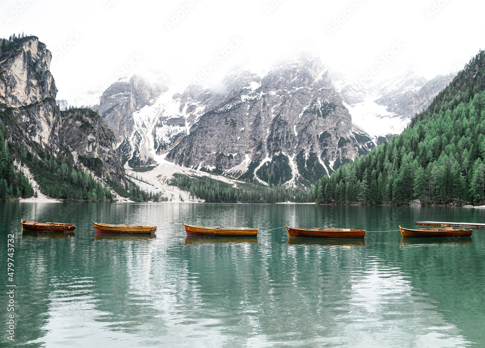 Lago di braies in italy with beautiful little boats