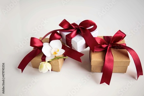 gift box with ribbon and flower orchid