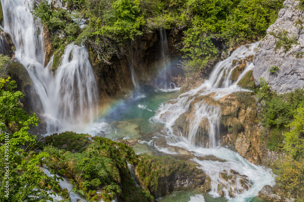 Fototapeta premium Rainbow at Sastavci waterfall in Plitvice Lakes National Park, Croatia