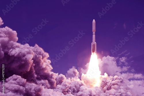 Fototapeta Naklejka Na Ścianę i Meble -  Take off space rocket on a background of blue sky and sun. Elements of this image were furnished by NASA