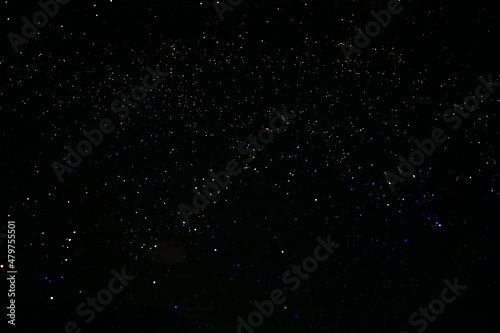 abstraction of a star on a small black background