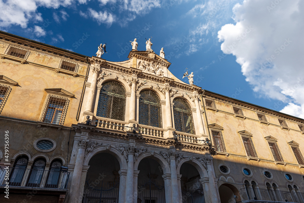 Vicenza downtown. Main facade of the Church of San Vincenzo (Saint Vincent of Zaragoza) in Gothic and Baroque style, XIV century (1385-1707), Piazza dei Signori, Veneto, Italy, Europe.