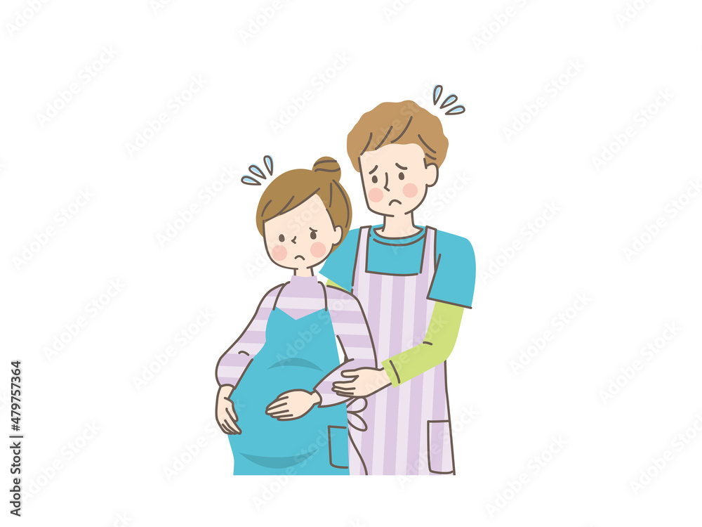 お腹の中の赤ちゃんを心配する妊婦と寄り添う夫