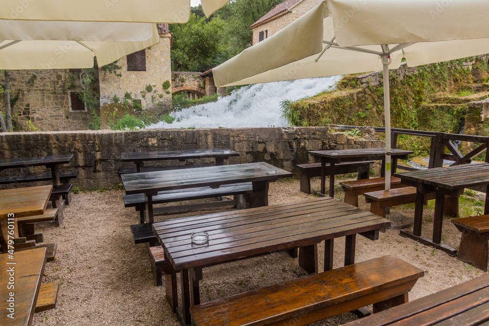 Tables of an open air restaurant in Krka national park, Croatia