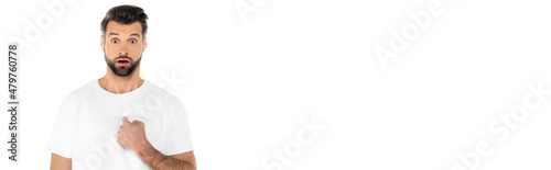 discouraged man pointing at himself while looking at camera isolated on white, banner.