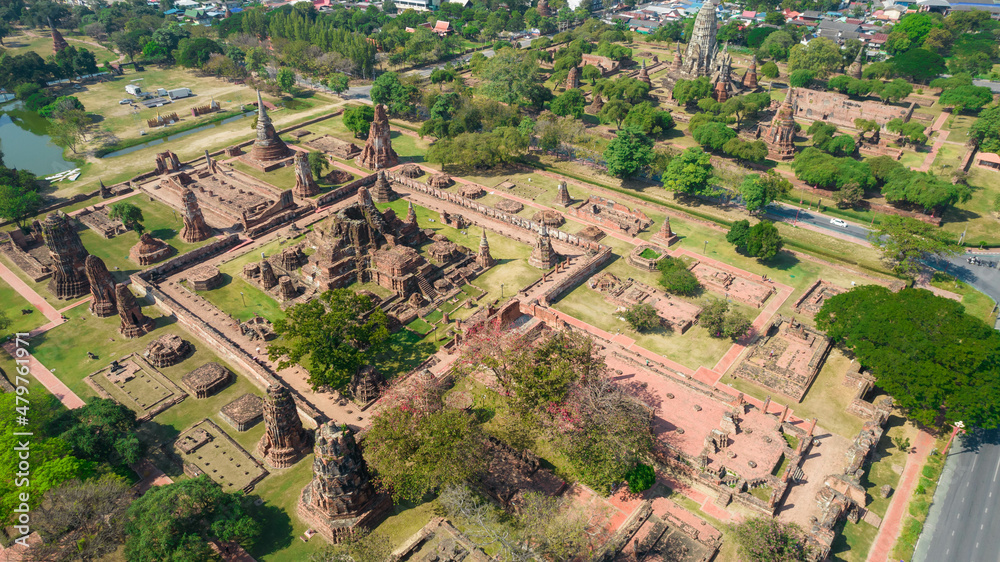 Aerial view from a drone of Wat Mahathat at Ayutthaya Historical Park, Thailand, an ancient site or landmark considered by UNESCO as a World Heritage Site.