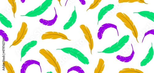Nature seamless pattern of palms or feather. Color of Mardi Gras.