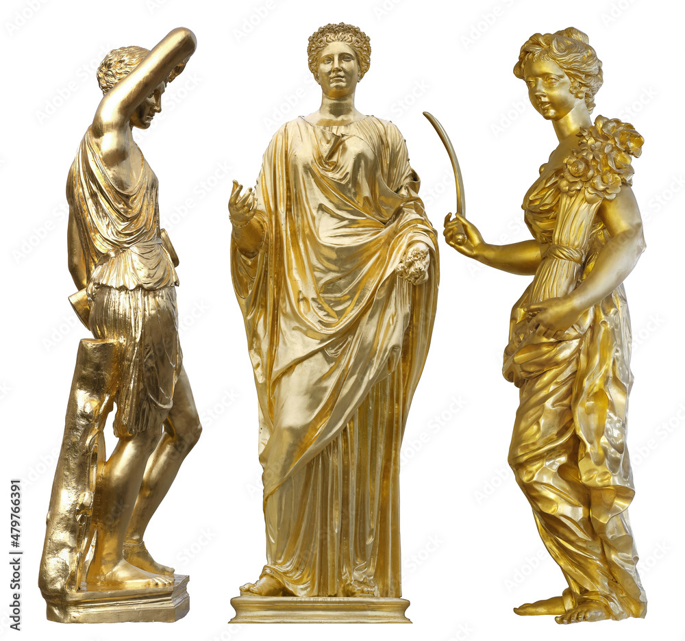 Three golden statues of antique goddesses isolated on white background