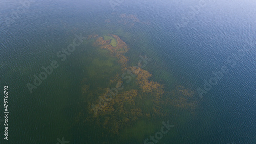 The Lake Szelment in the Suwalki Region in autumn colors © andrzej_67