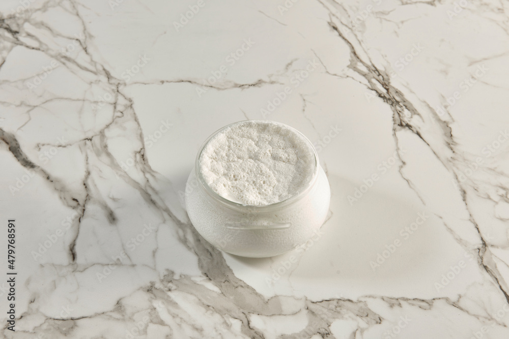 Natural yogurt on the marble table background, healthy lifestyle, dairy products. Natural yogurt on the marble table background, healthy lifestyle, dairy products.