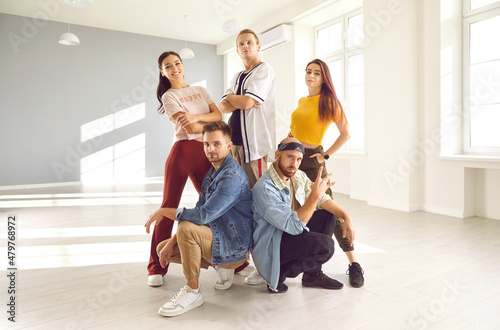 Fotografie, Obraz Group portrait of diverse young people dancers pose together in studio advertise school or classes