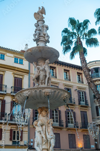 Water fountain in the Plaza de la Constitucion in the city of Malaga, Andalusia. Spain