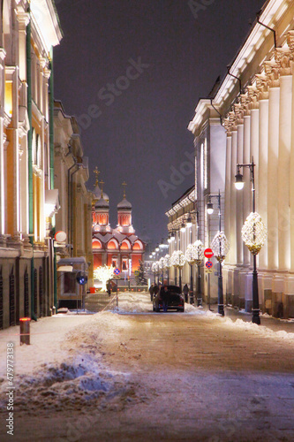 View of Moskovskaya Street, the city center, on a frosty winter evening after a heavy snowfall. photo