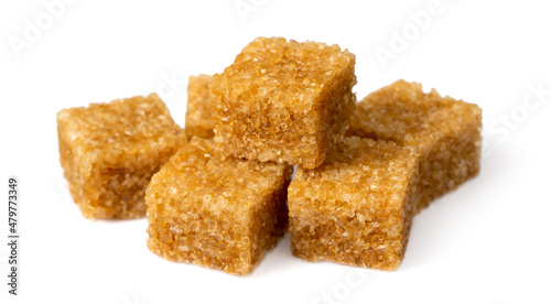 Brown sugar cubes isolated on white background