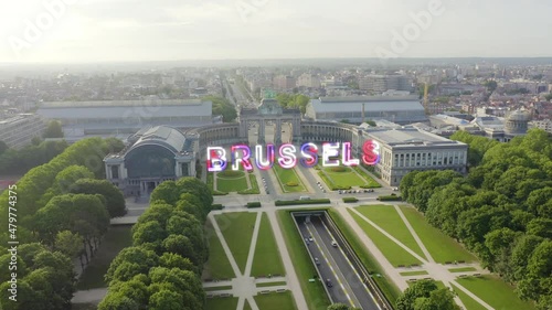 Inscription on video. Brussels, Belgium. Park of the Fiftieth Anniversary. Park Senkantoner. The Arc de Triomphe of Brussels (Brussels Gate). Glitch effect text, Aerial View, Point of interest photo