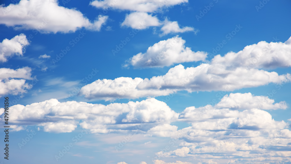 Blue sky with soft white clouds in sunny day Blue sky with soft white clouds in sunny day