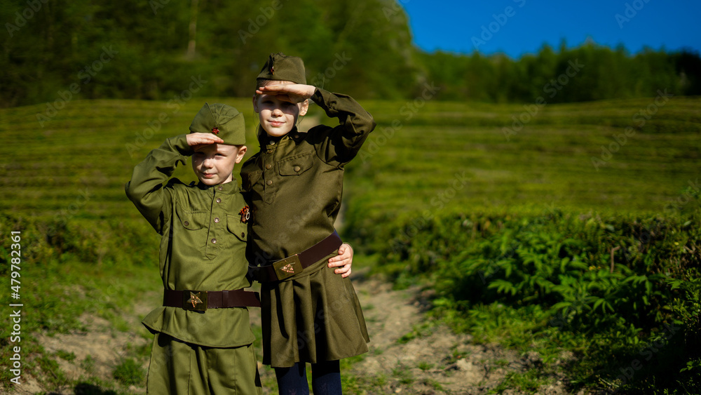 Children in military uniform of the USSR, Military children, Child soldiers,  Children in nature, A girl and a boy in military uniform