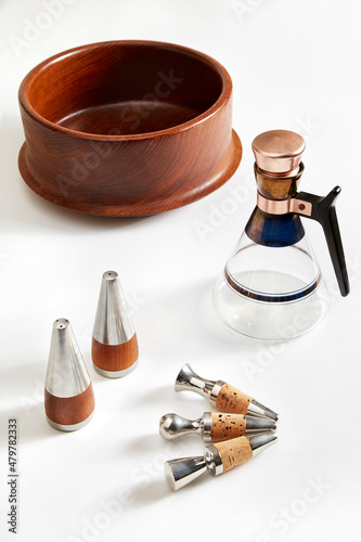 Vintage kitchenware. Mid Century, Atomic Coffee Carafe with Cork Stopper and Copper Accents. Handmade Teak Serving Bowl with Flared Base. Teak and Stainless Steel Salt & Pepper Shakers. 