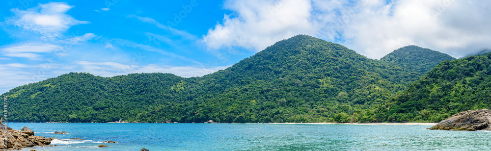Panoramic image of Trindade in Paraty and the meeting of the tropical forest and its dense and preserved vegetation with the sea