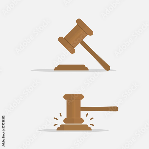 Judge's gavel. Judges gavel hammer for adjudication of sentences and bills, with a wooden stand. Law and justice concept. Wooden auction hammer