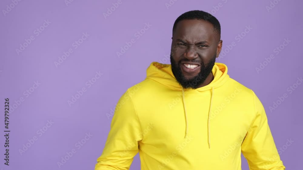 Excited guy ecstatic fist up lucky lottery isolated bright color background Excited guy ecstatic fist up lucky lottery isolated bright color background