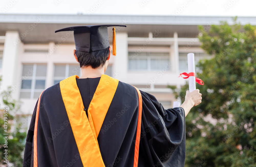 The graduates raised their hands to celebrate graduation with a ...