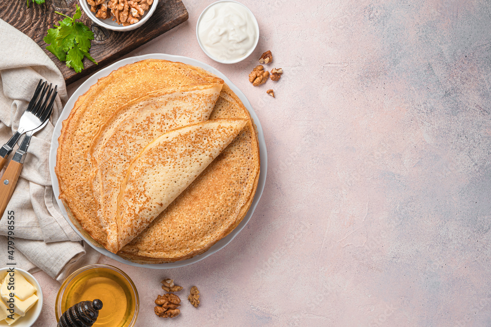 Ταπετσαρία Traditional Russian blini on a light background with sour cream, honey and nuts