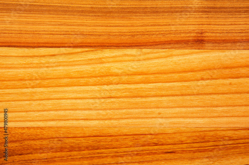 background and texture of smooth treated wood close-up diagonally.