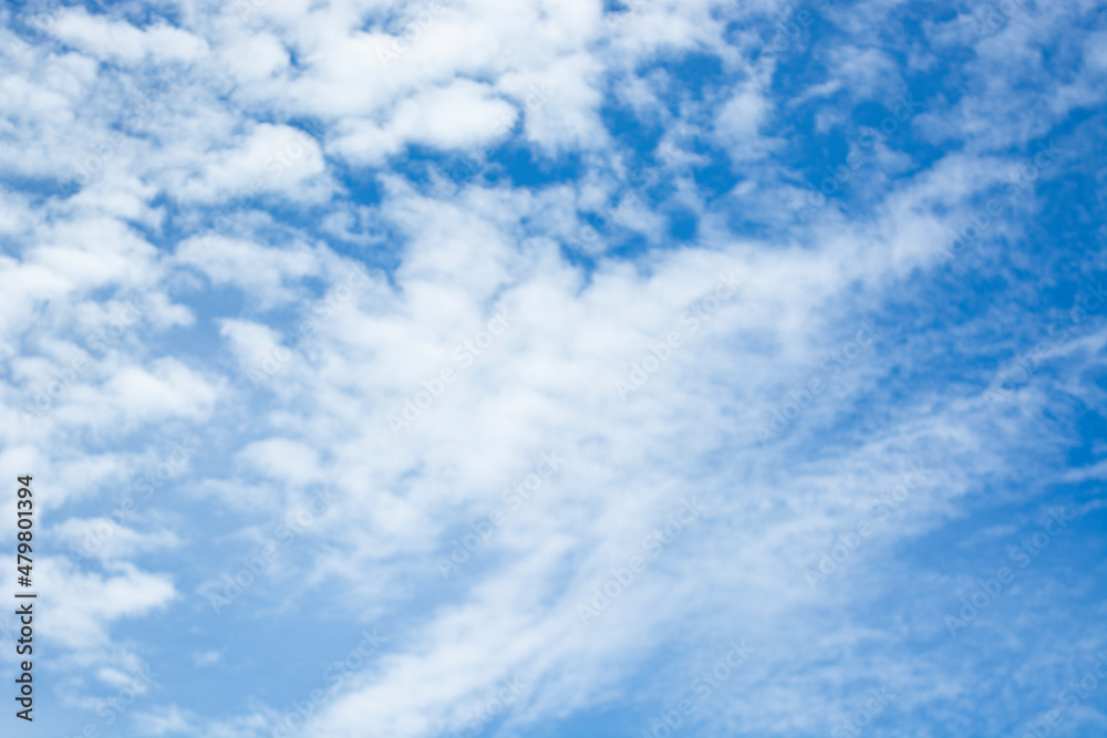 Blue sky background with clouds at the ocean Blue sky background with clouds at the ocean
