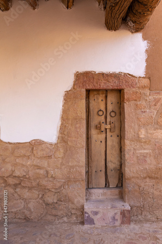 tiny door in a traditional house in Saudi Arabia photo