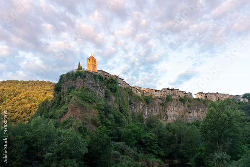 view of the rock that supports the medieval village of Castellfollit de la Roca in Catalonia, Spain. photo