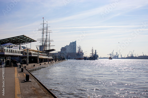 Panoramic view of Hamburg city with the Elbe river, Germany, Europe. Beautiful view of crowded Hamburg waterfront, tourist boats and ships.