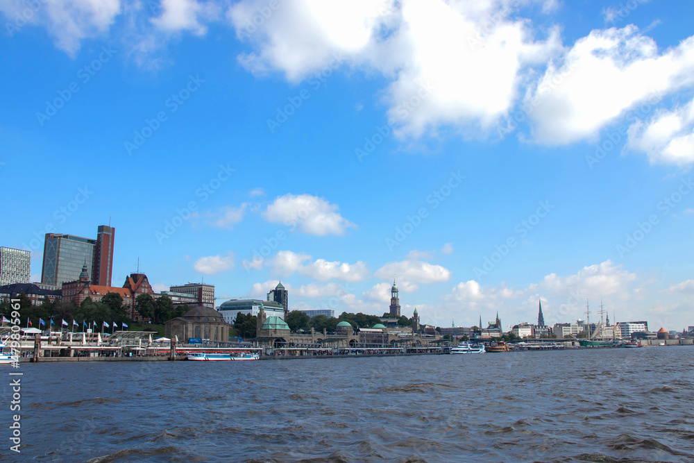 Panoramic view of Hamburg city with the Elbe river, Germany, Europe. Beautiful view of crowded Hamburg waterfront, tourist boats and ships.