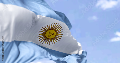 Canvas Print Detailed close up of the national flag of Argentina waving in the wind on a clear day