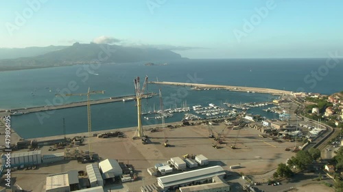 Aerial view of arbatax port in Sardinia island, ferry connection with Italy, coastline footage during sunny day of summer photo