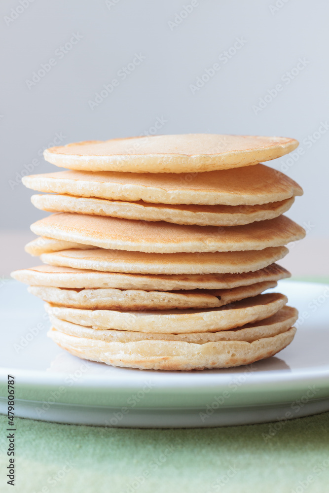 Pile of pancakes illuminated with natural light Pile of pancakes illuminated with natural light