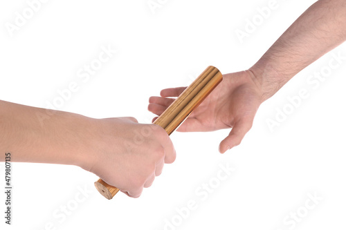 Man passing relay baton to teammate isolated on white, closeup