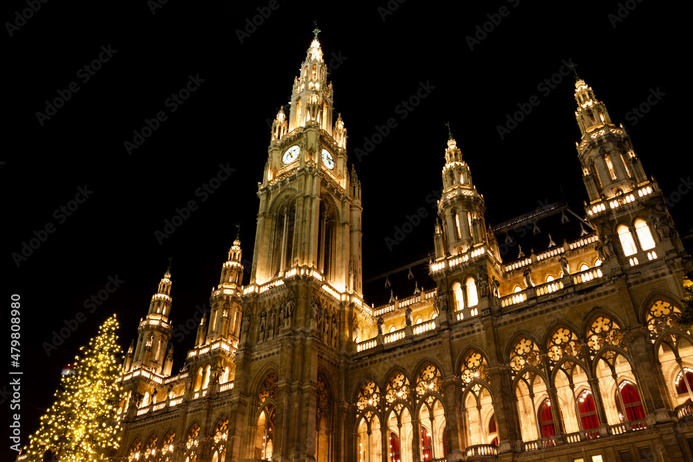 Vienna City Hall by night. Wiener Rathaus on Rathausplatz in the Innere Stadt district. Office of the Mayor, chambers of city council and Landtag, Austria.